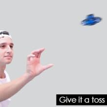 Flying spinner toss